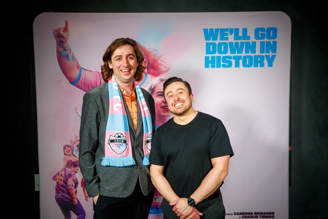Two guests at a red-carpet gala screening