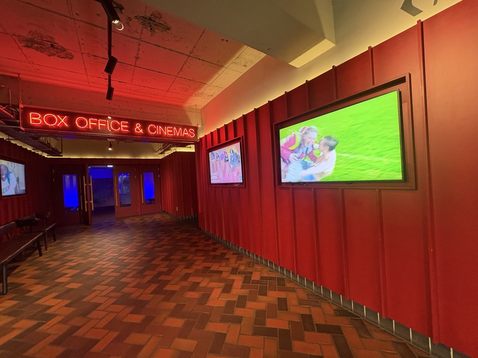 Cinema foyer with box office signage